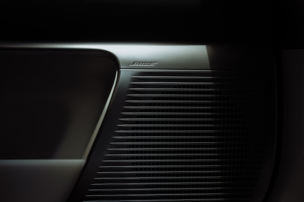 Close-up of a Bose speaker grille in the IONIQ 9 door trim