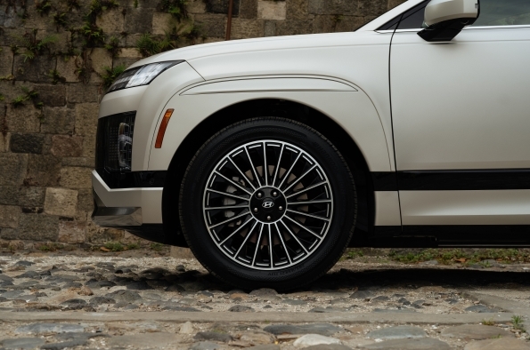 Close-up of an IONIQ 9 alloy wheel and tire